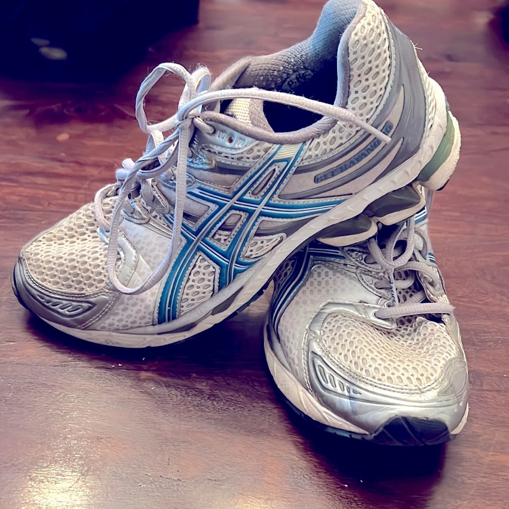 Aasics Women’s sneakers size 9 Grey with blue accent. Good for wide foot. Used.